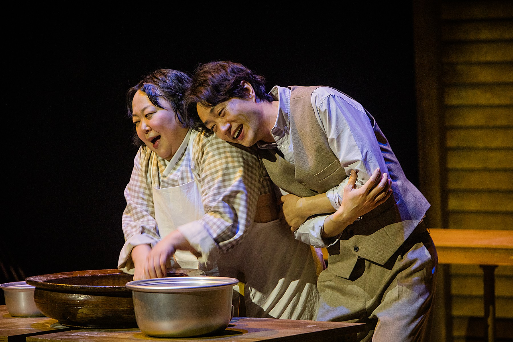 Hands shaping bread
